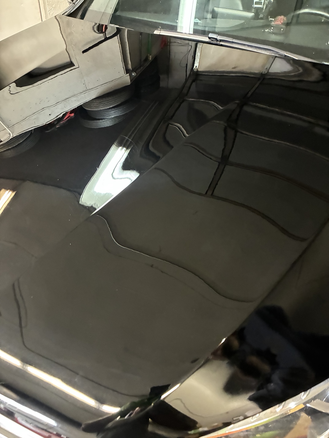 Gloss black hood reflection
